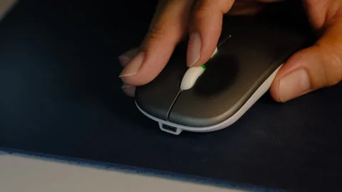 Image of female hand touching computer mouse. Stock Footage 309218867