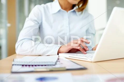 Image of female hands typing on keyboard in office Stock Photos