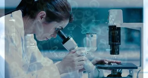 Image of female scientist looking into a microscope combined with animated Stock Photos