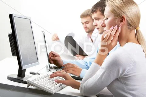 Image of female typing on keyboard in working environment Stock Photos