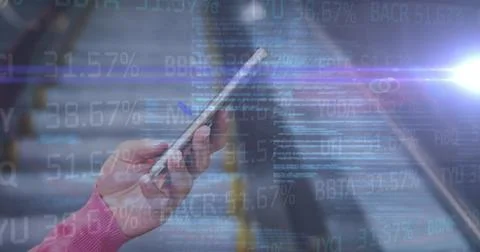 Image of financial data and code over hands of caucasian man using smartphone 스톡 사진