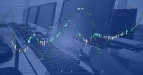 Image of financial data processing against computers on office desks Foto stock
