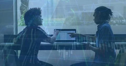 Image of financial data processing against two diverse man discussing over a Stock Photos