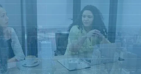 Image of financial data processing and world map over diverse business people in Stock Photos