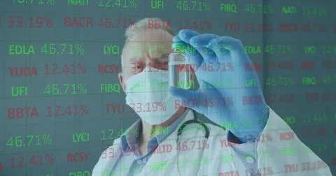 Image of financial data processing and male doctor in face mask holding vaccine Stockfoto's