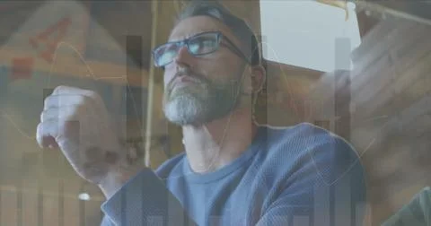 Image of financial data processing and statistics over caucasian man using Stock Photos