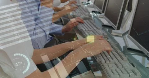 Image of financial data processing over diverse business people using computers Stock Photos