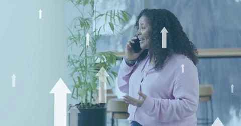 Image of financial data processing over biracial businesswoman in office Stock Photos
