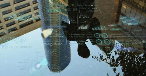 Image of financial data processing over man and cityscape 库存照片