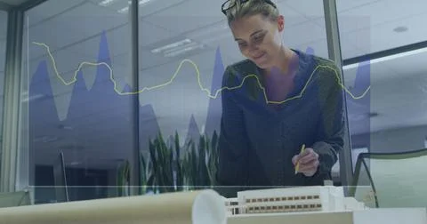 Image of financial data processing over biracial businesswoman 写真素材
