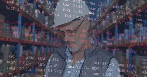 Image of financial data processing over man working in warehouse 스톡 사진