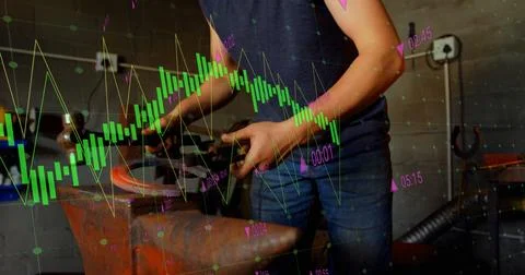 Image of financial data processing over caucasian man in workshop Stock Photos