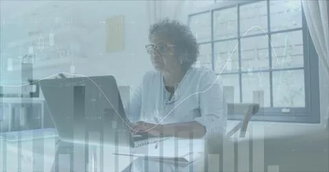 Image of financial data processing over senior woman using laptop paying bills 库存照片