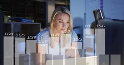 Image of financial data processing over caucasian businesswoman working in 库存照片