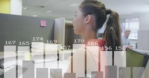 Image of financial data processing over caucasian businesswoman using computer Stock Photos