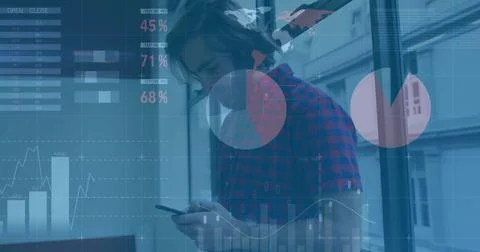 Image of financial data processing over caucasian businessman using smartphone 写真素材