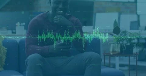 Image of financial data processing over african american businessman using Stock Photos