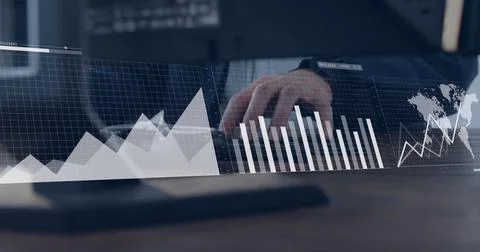 Image of financial data processing over businessmen using computer Stockfoto's
