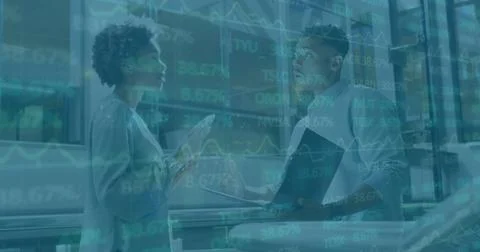 Image of financial data processing over diverse business people using laptop Foto stock