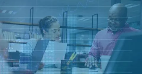 Image of financial data processing over diverse business people in office Stock Photos