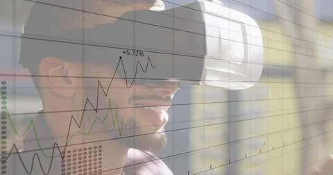 Image of financial data processing over businessman using vr headset Stock Photos