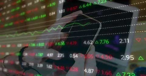 Image of financial data processing over man using smartphone Foto stock