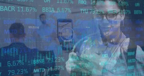 Image of financial data processing over business people in office 写真素材