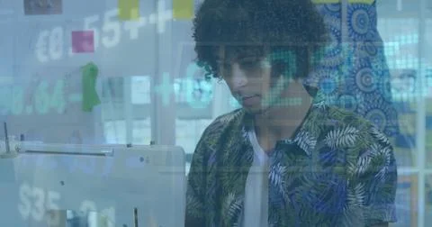 Image of financial data processing over man using graphic tablet Stock Photos
