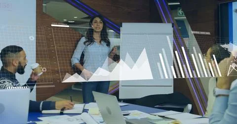 Image of financial data processing over diverse business people in office 写真素材