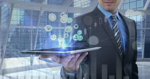 Image of financial data processing over man using tablet Stock Photos