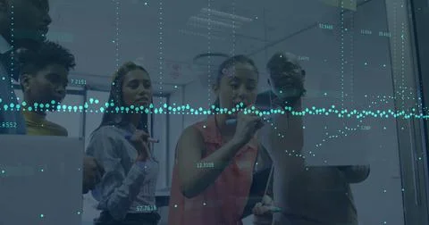 Image of financial data processing over diverse business people in office Foto stock