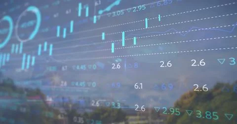 Image of financial data processing over cityscape Foto stock