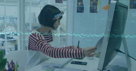 Image of financial data processing over businesswoman using computer Stock Photos