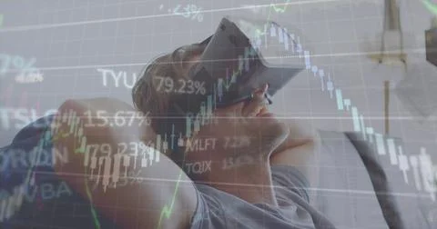 Image of financial data processing over caucasian man using vr headset Stock Photos