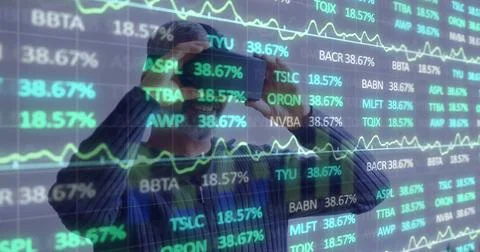 Image of financial data processing over caucasian man using vr headset Stock Photos