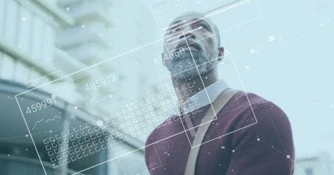 Image of financial data processing over african american man in city Stock Photos