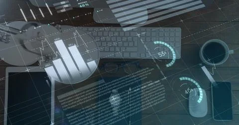 Image of financial data processing over tablet and computer on desk Foto stock