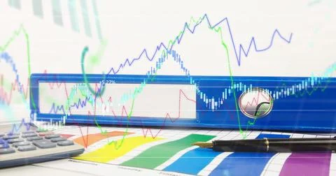 Image of financial data processing over desk with blue file 库存照片