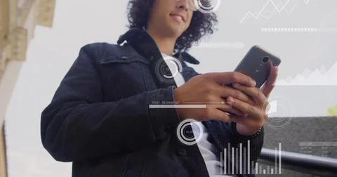 Image of financial data processing over caucasian man using smartphone Foto stock