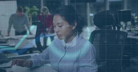 Image of financial data processing over biracial businesswoman working in office Foto stock