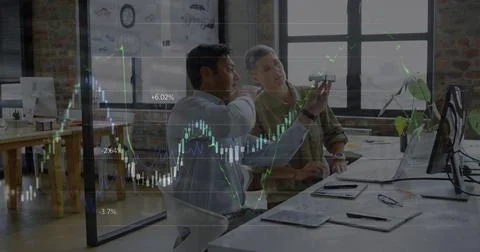 Image of financial data processing over diverse business people in office Foto stock