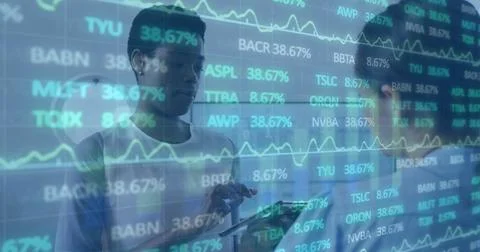 Image of financial data processing over diverse business people in office Stock Photos