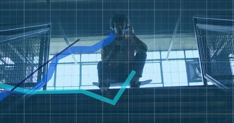 Image of financial data processing over biracial man using smartphone Stock Photos