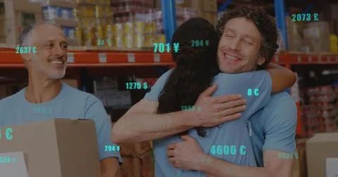 Image of financial data processing over smiling diverse volunteers in warehouse Foto stock