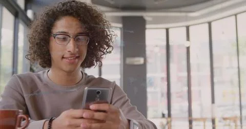 Image of financial data processing over biracial man using smartphone in office 스톡 사진