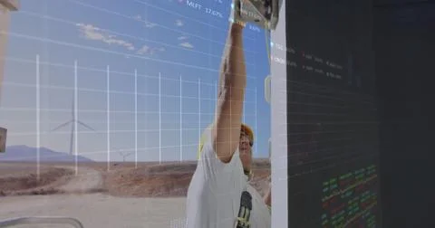 Image of financial data processing over caucasian engineer and wind turbine Stock Photos