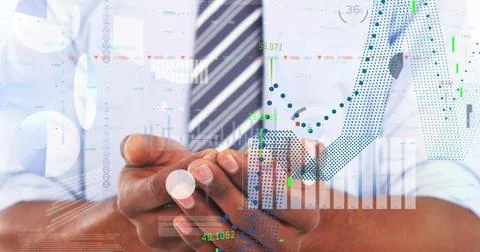 Image of financial data processing over african american businessman holding Foto stock