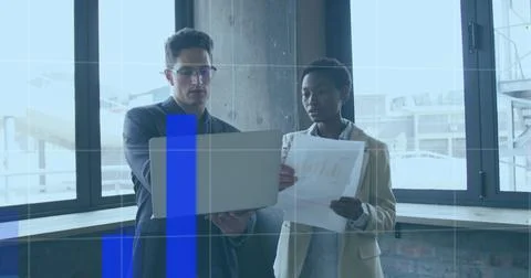 Image of financial data processing over diverse business people using laptop Foto stock