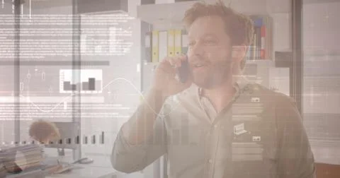 Image of financial data processing over man using smartphone Foto stock
