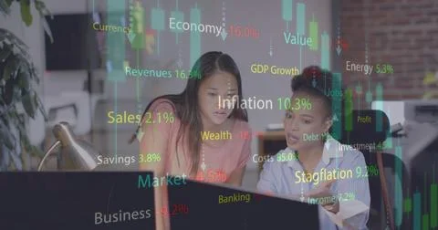 Image of financial data processing over diverse businesswomen in office Stockfoto's